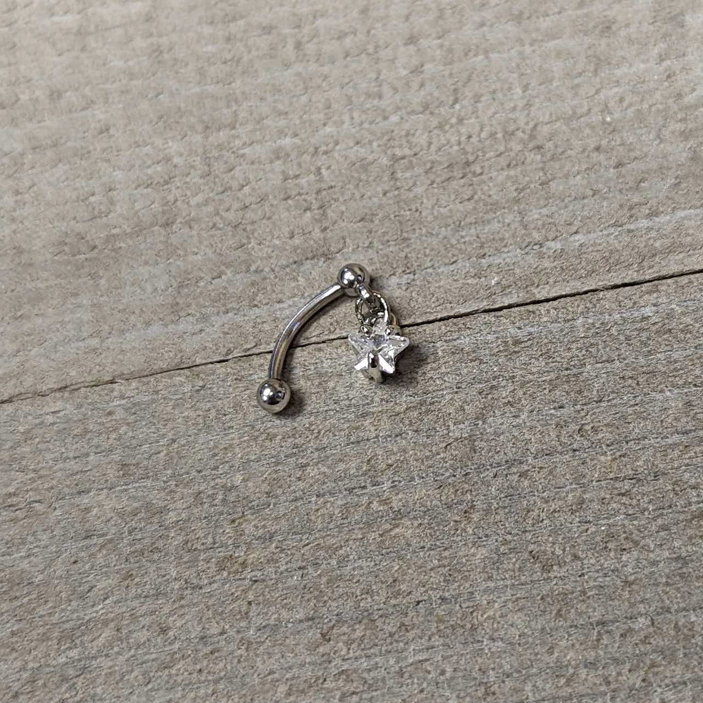 Top Down Clear Gem Dangle Star Eyebrow Ring