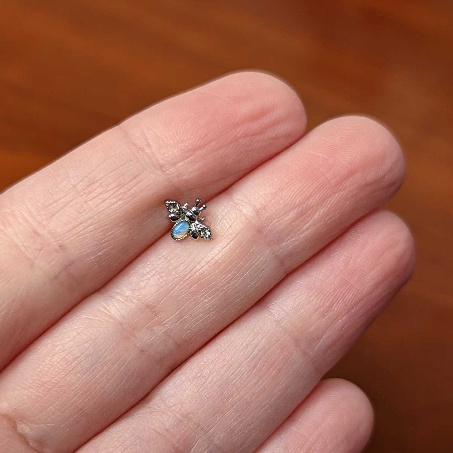 16G 1/4 White Synthetic Opal Insect Cartilage Tragus Earring